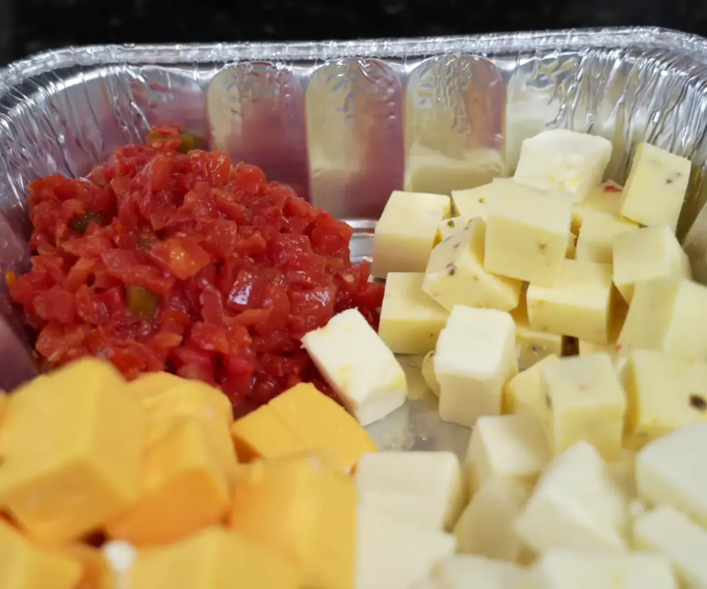 assemble cheese in pan for smoked queso recipe