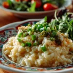 Cheesy salsa verde chicken served on a plate with rice and toppings.