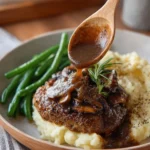 Southern Salisbury Steak served with rich gravy and sides