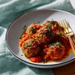 Chef John's delicious Italian meatballs served with marinara sauce