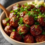 Easy BBQ meatballs served on a platter with barbecue sauce