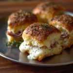 Ham and cheese party sandwiches ready for serving at a gathering