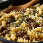 Delicious ground beef stroganoff served in a bowl with noodles and mushrooms