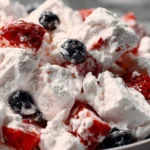 Very Berry Cheesecake Salad with fresh berries and creamy cheesecake topping