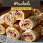 Delicious ham and cheese pinwheels ready to serve at a party or gathering.