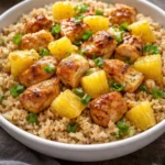 Pineapple Chicken Stir-Fry served in a bowl with vegetables and rice