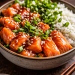 Delicious salmon rice bowl topped with fresh ingredients and served in a bowl