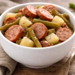 Delicious bowl of Hoosier Stew with smoked sausage, green beans, and potatoes