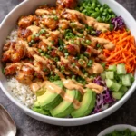 Delicious Bang Bang Chicken Bowl with crispy chicken and fresh vegetables