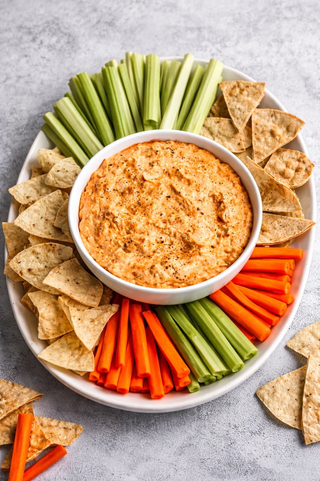 Delicious Buffalo Chicken Dip served in a bowl with tortilla chips