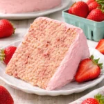 Delicious fresh strawberry cake with vibrant strawberries and creamy frosting