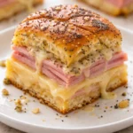 Ham and cheese sliders served on a platter, perfect for gatherings