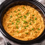 Delicious Crockpot Buffalo Chicken Dip served in a bowl with tortilla chips