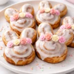 Easter-themed cinnamon rolls shaped like bunnies for festive brunch.