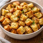 Easy baked croutons made from fresh bread, perfect for adding crunch to salads.