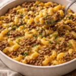 Ground Beef Hamburger Casserole baked in a dish, garnished and ready to serve.