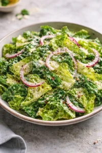 A vibrant bowl of homemade Parmesan Chopped Salad with fresh vegetables and cheese