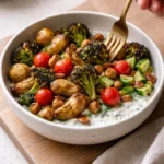 Colorful Plant-Based Mediterranean Bowl featuring fresh vegetables and grains