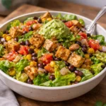 Colorful Santa Fe Salad with fresh vegetables and dressing