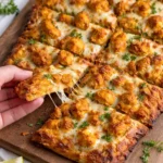 Delicious Tandoori Chicken Garlic Bread served with vibrant herbs and spices.