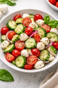 Juicy Cucumber Caprese Salad with fresh ingredients and vibrant colors