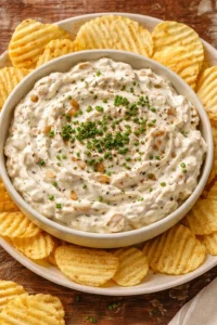 Bowl of easy French onion dip served with crispy chips